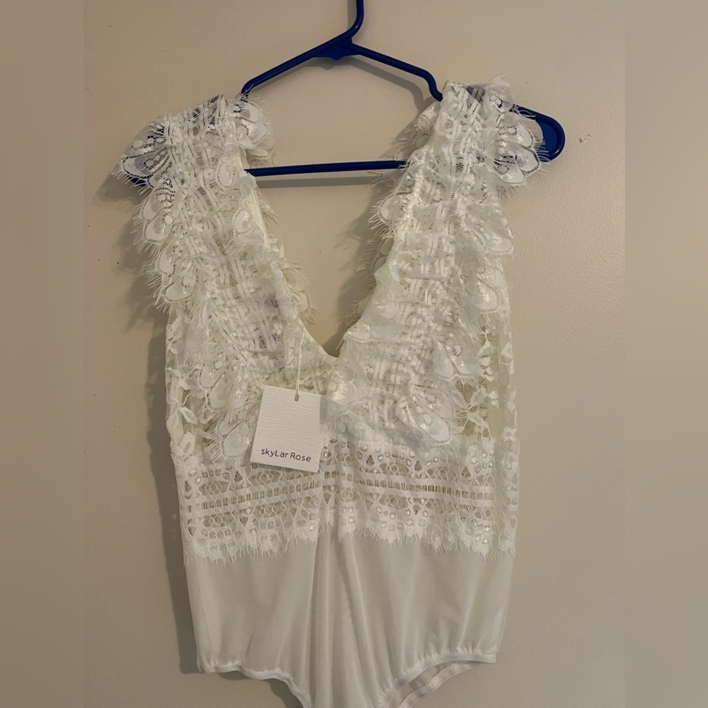 White lace bodysuit. NWT